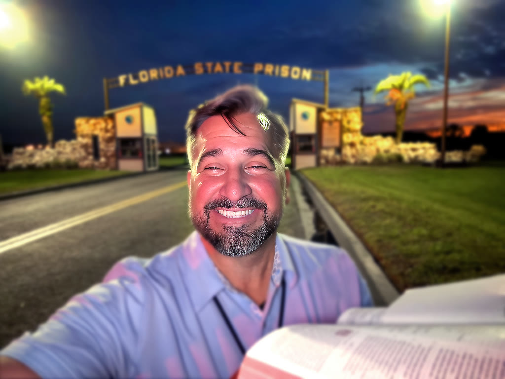 Calvin Bryant in front of Florida State Prison at dusk